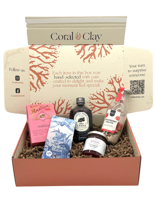 Coral & Clay corporate gift box with bottle, jar and gourmet snacks on a white background