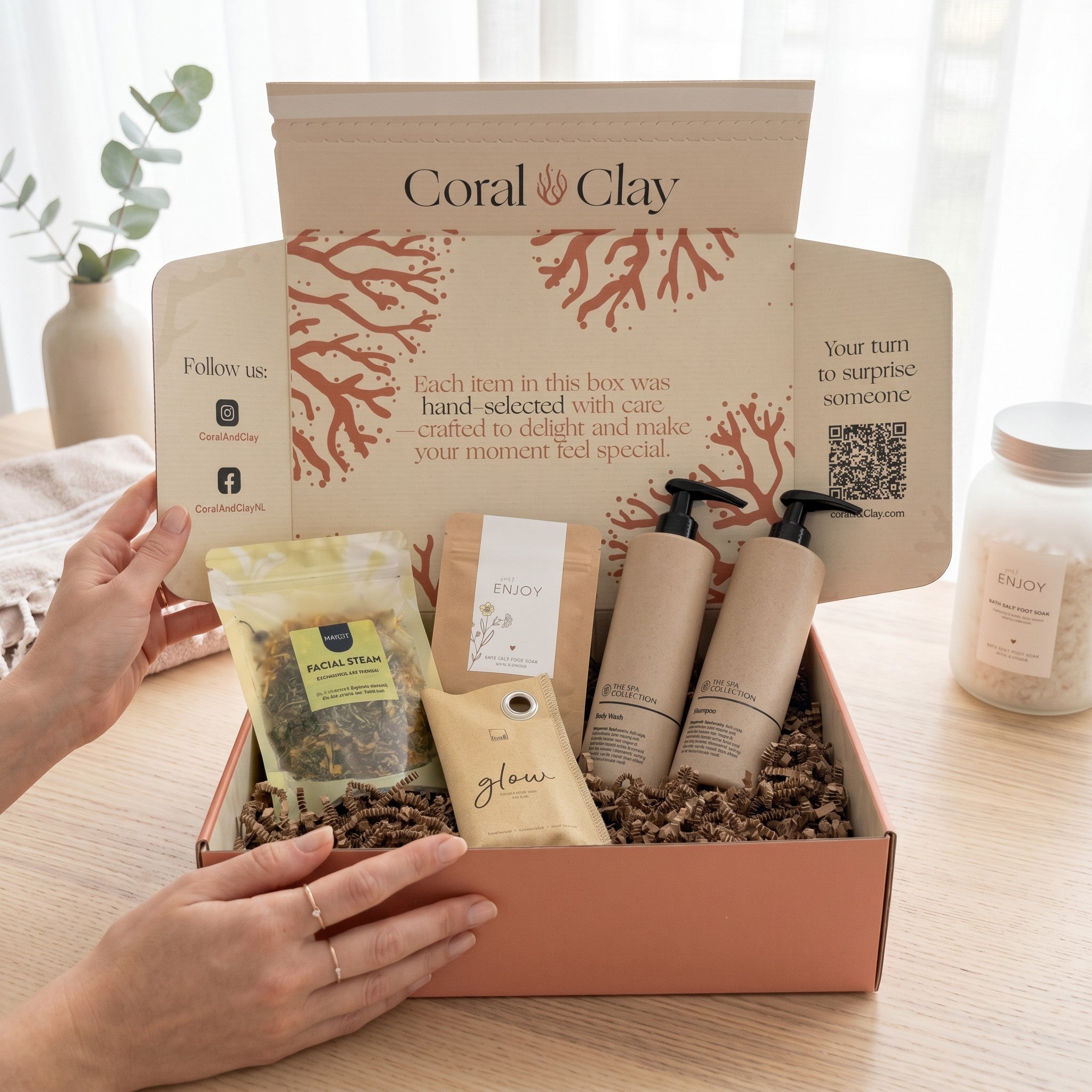 Home Spa Signature Gift close-up on wooden surface with coffee scrub soap bar, chamomile peppermint facial steam, foot bath salts, Spa Collection body wash and shampoo.