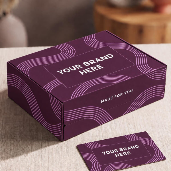Purple branded gift box with custom logo placement, wave-patterned packaging and a matching card