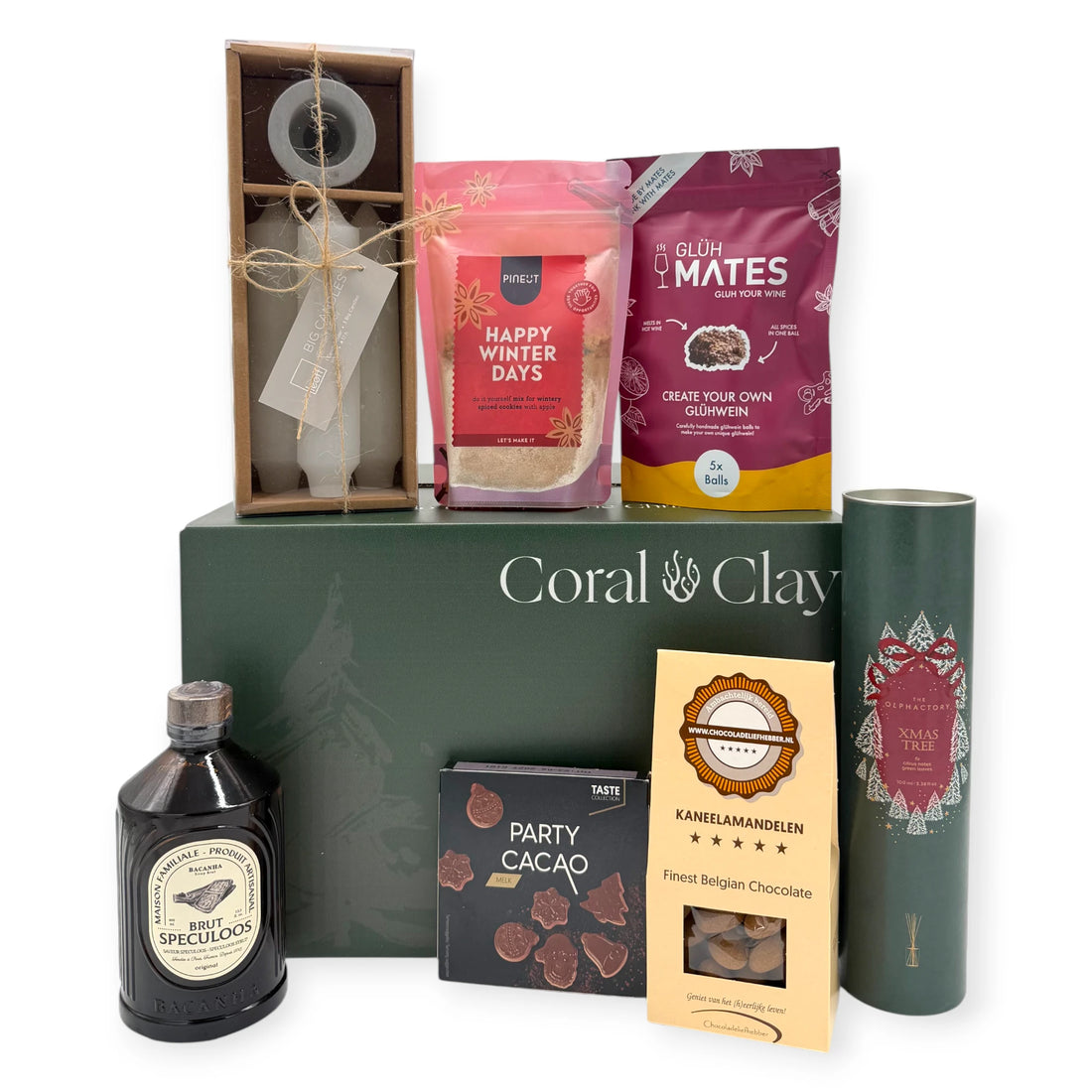 Grand Happy Santa Gift Box presented with festive treats including Happy Winter Days cookie mix, Glüh Mates mulled wine spices, Brut Speculoos liqueur, cinnamon almonds, Belgian chocolate party shapes, taper candles, and an Xmas Tree diffuser arranged around a Coral & Clay Christmas gift box.