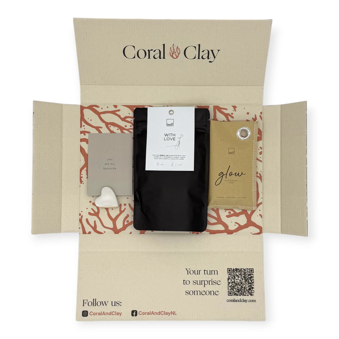 Coral & Clay With Love Letterbox Gift displayed with Leeff Smile sachet, With Love herbal tea pouch, and a minimalist message card with ceramic heart stand.
