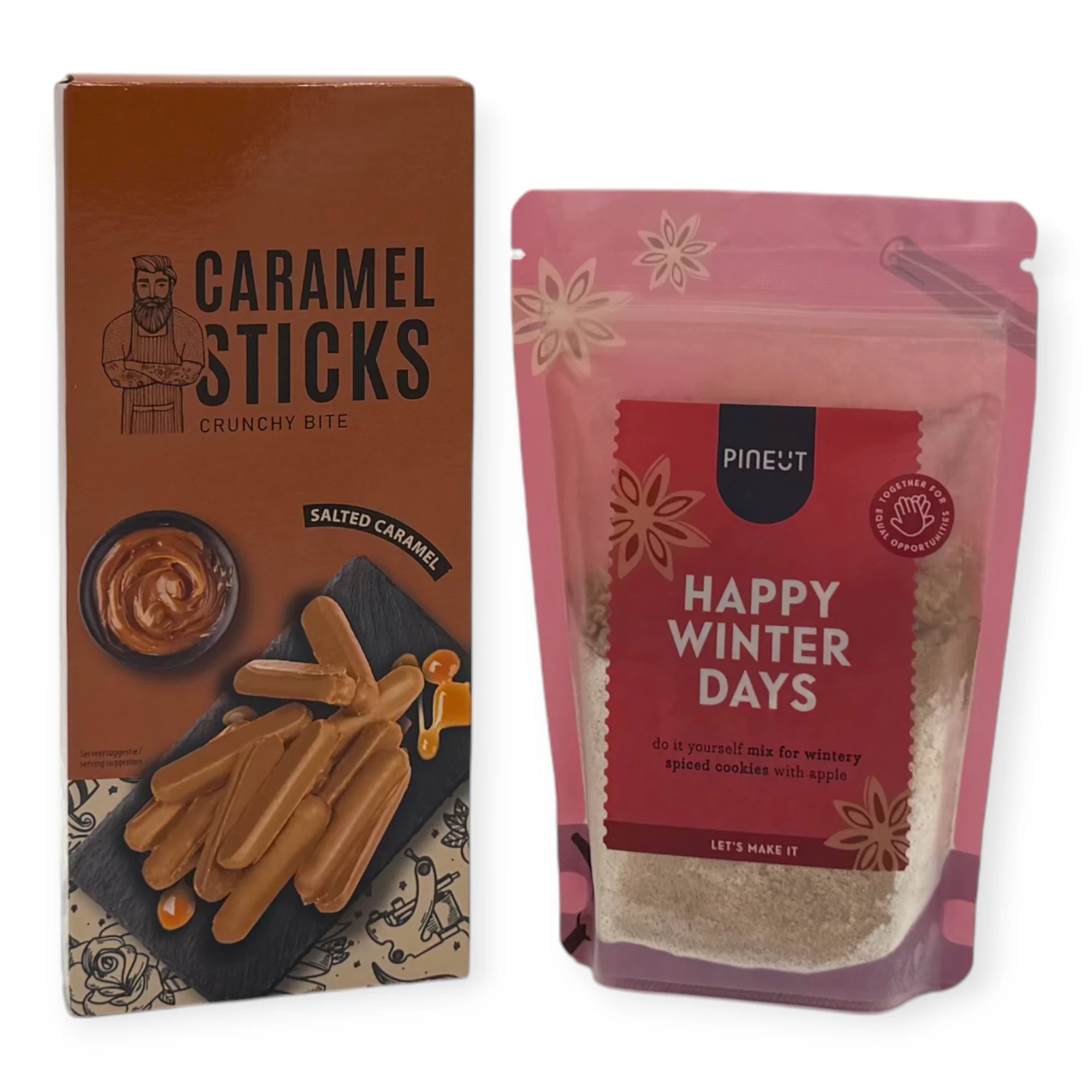Contents of the Coral & Clay Winter Treats Letterbox Gift featuring Pineut Happy Winter Days cookie mix and salted caramel crunchy sticks.