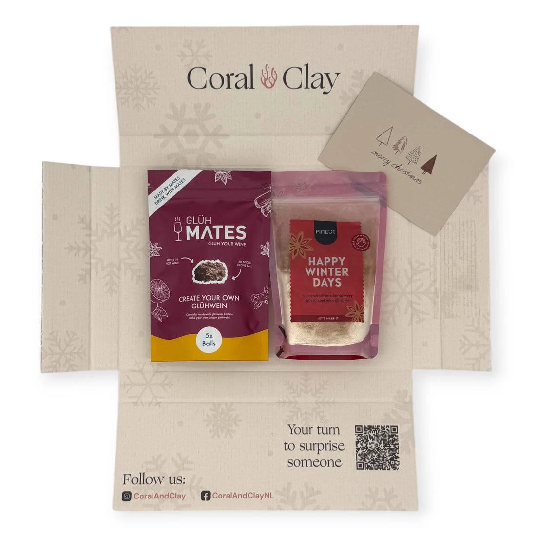 Coral & Clay Winter Warmth Christmas Letterbox Gift displayed with Glüh Mates glühwein mix and Pineut Happy Winter Days cookie mix.