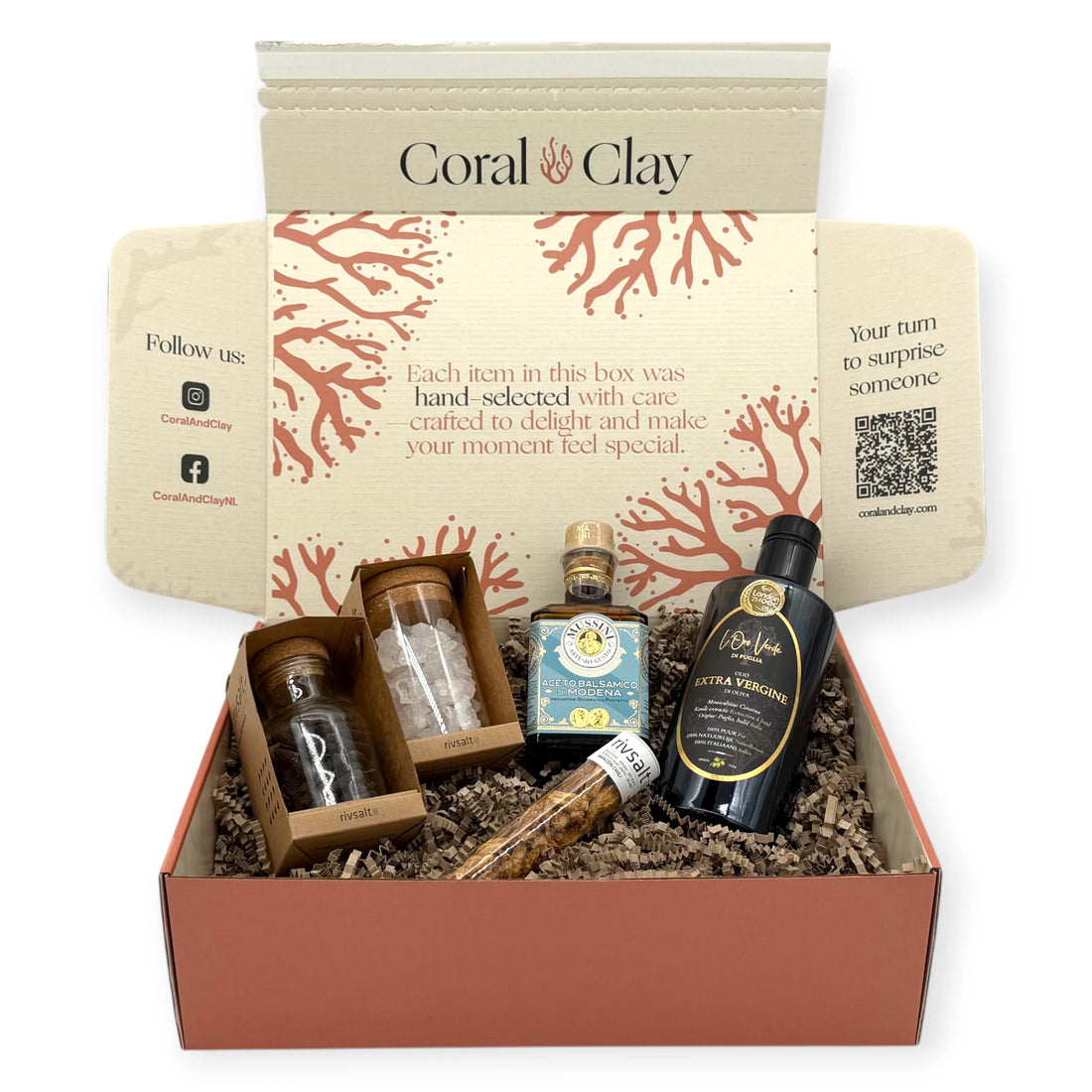 Premium Kitchen Essentials Signature Gift Box with gourmet olive oil, balsamic vinegar, Rivsalt seasonings, and artisan spices arranged in front of the Coral & Clay gift box.
