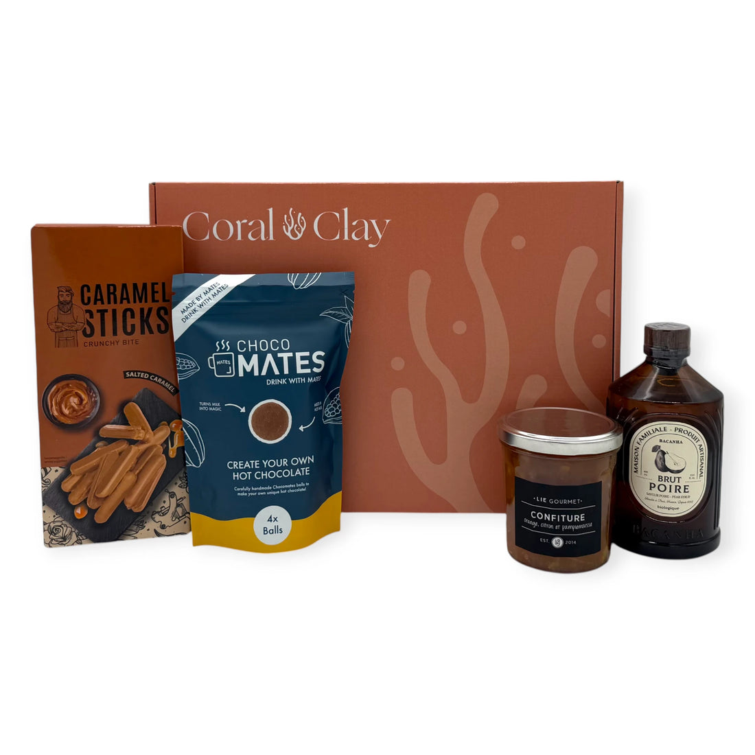 Sweet Indulgence Signature Gift presented with the Coral & Clay terracotta gift box, including Choco Mates hot chocolate mix, salted caramel sticks, Brut Poire syrup, and LIE Gourmet fruit confiture.