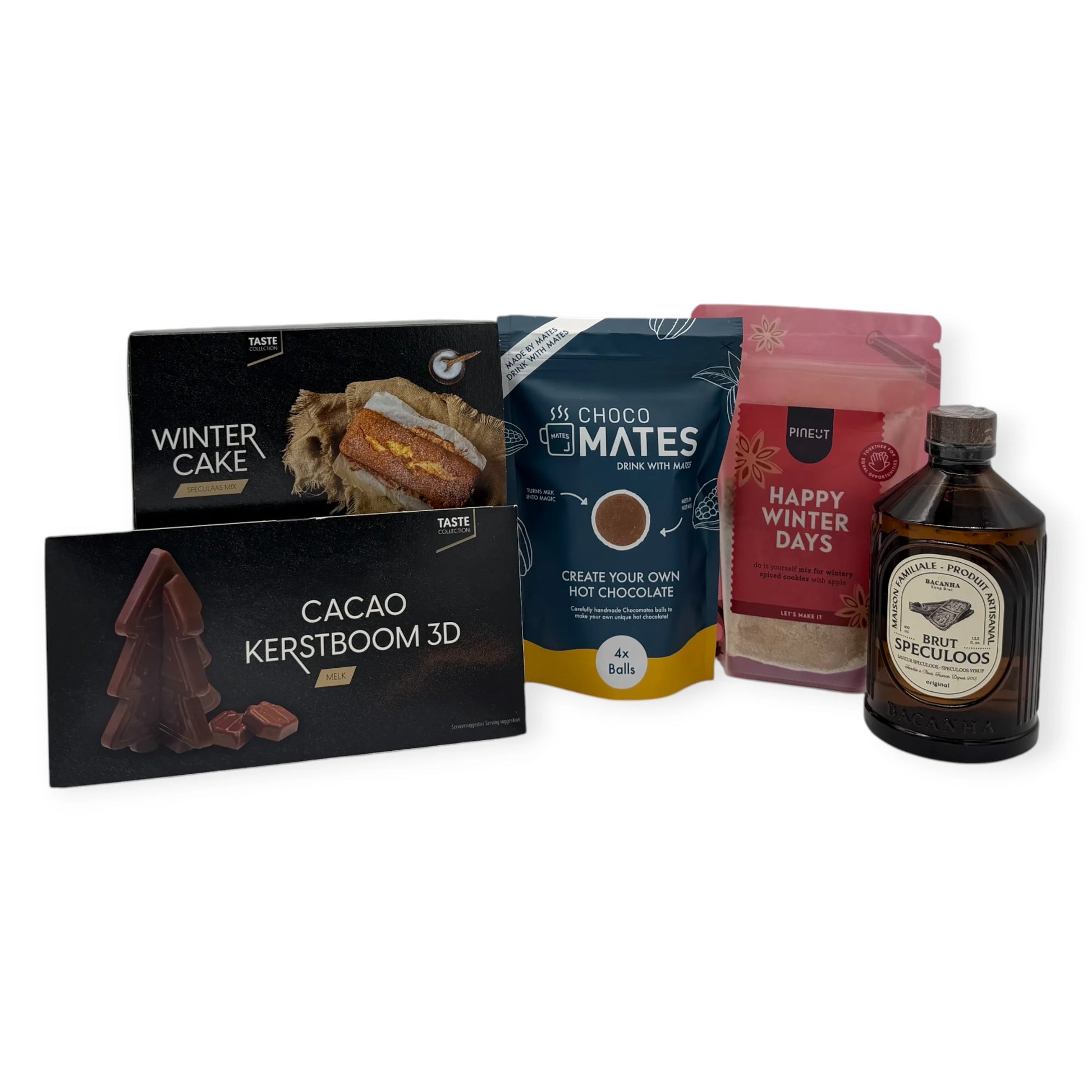 Winter Sweets Signature Gift set products arranged in a row: Winter Cake mix, 3D chocolate Christmas tree, Choco Mates hot chocolate balls, Happy Winter Days cookie mix, and Speculoos liqueur.